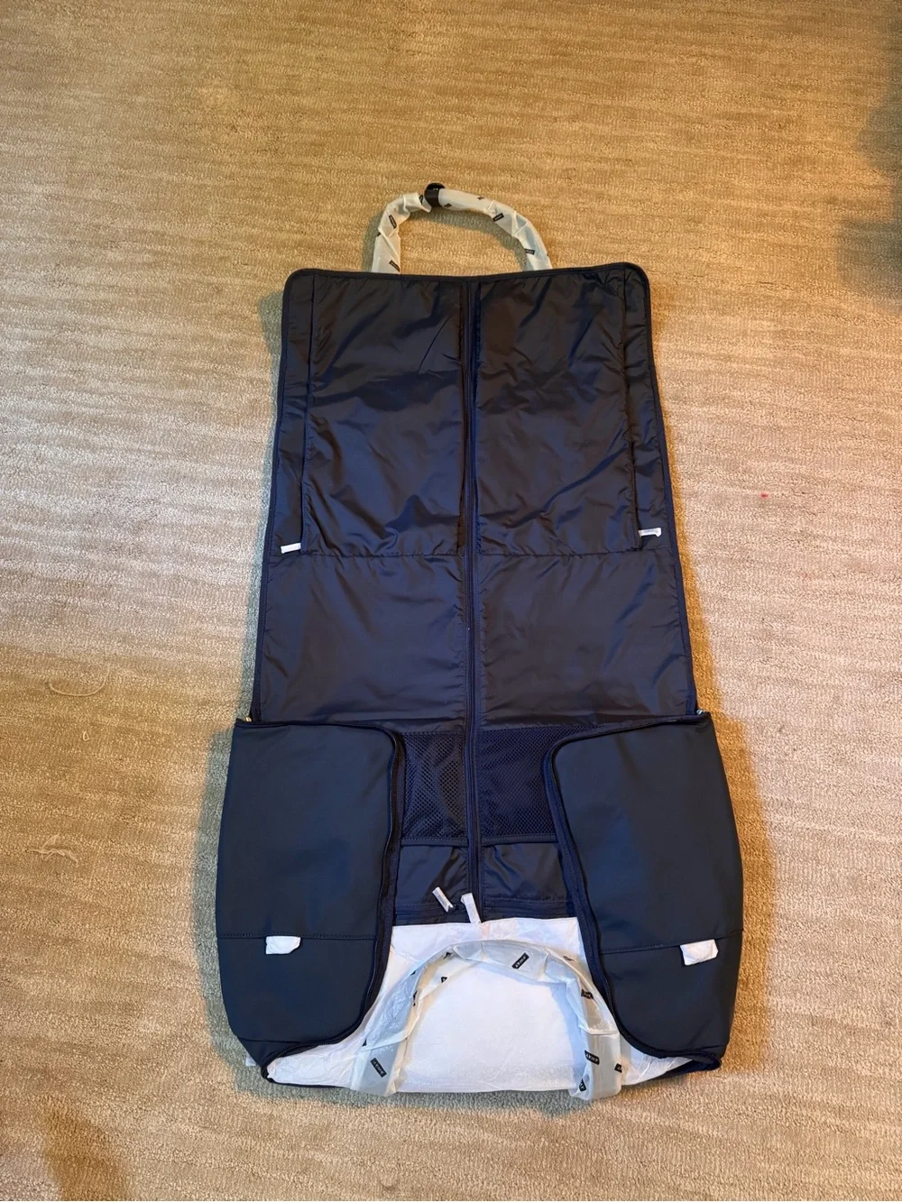 Away Navy Blue Garment Duffle with Black Handles and packing cubes